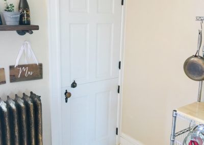 Closed Dutch door with antique handle and latch