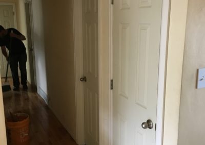 Hallway with 4 new doors of the same style color and trim