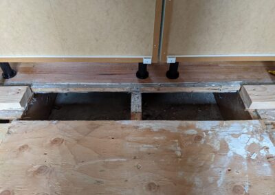 14. A hole in the subfloor was cut to accommodate the heat duct under the new peninsula in the home kitchen renovation
