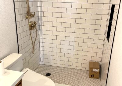 Beautiful new custom shower stall with white subway tiles