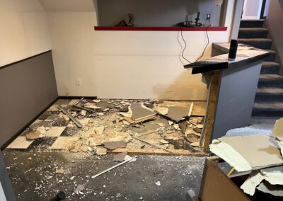 Demolition of an outdated bar in basement remodel