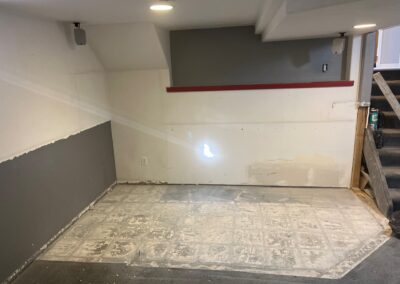 Bar removed from flood-damaged basement during remodel.